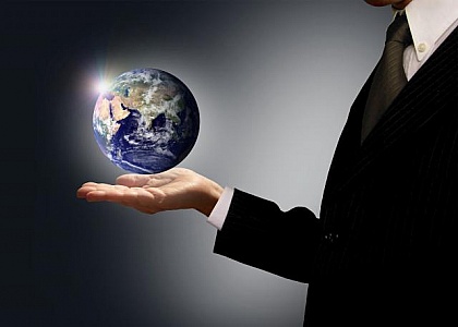 businessman holding earth globe globalization concept